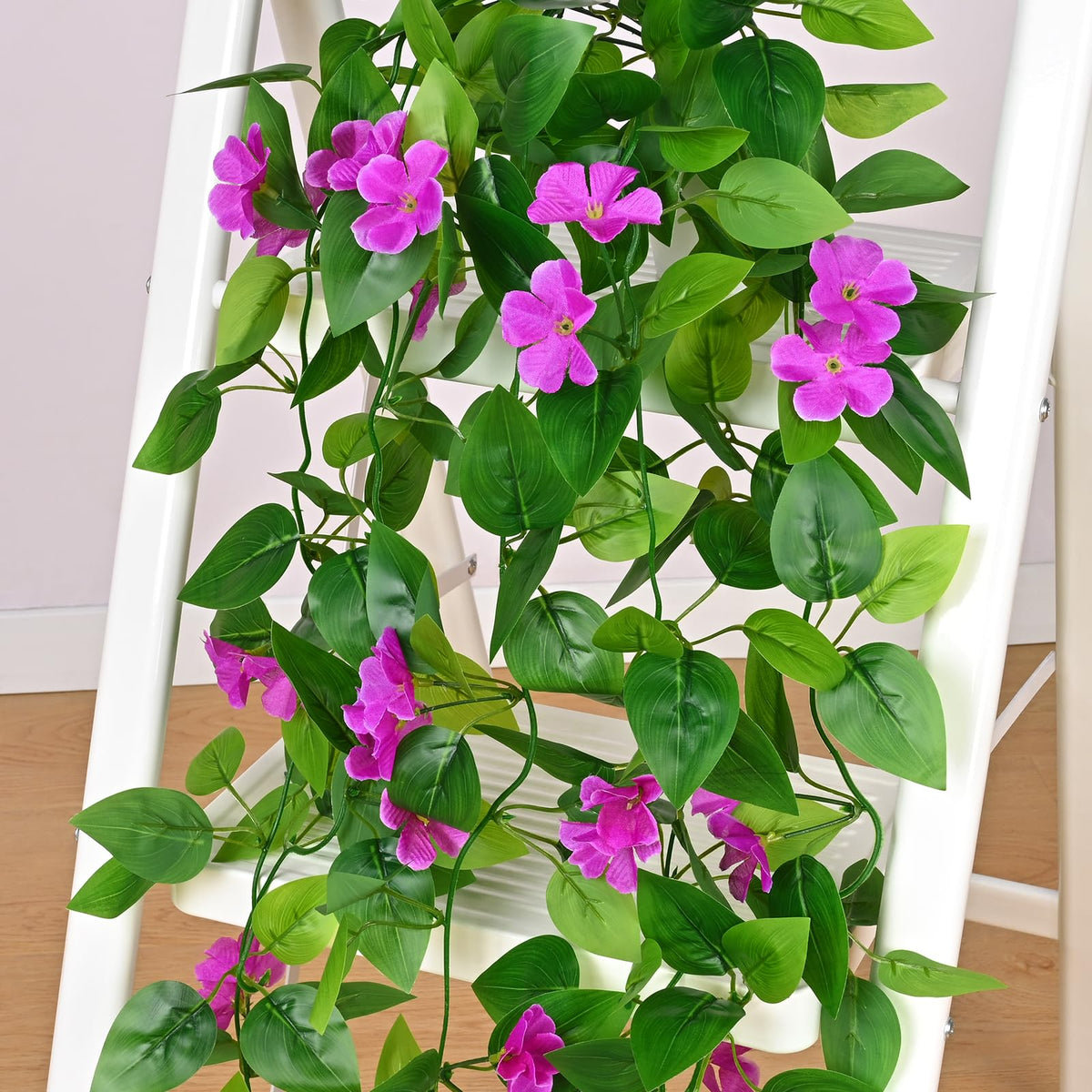 BLEUM CADE Artificial Hanging Flowers for Outdoors, 4pcs Fake Hanging Plants Pothos Vines with Purple Flowers for Wall Home Living Room Indoor Outdoor Decor (No Baskets)