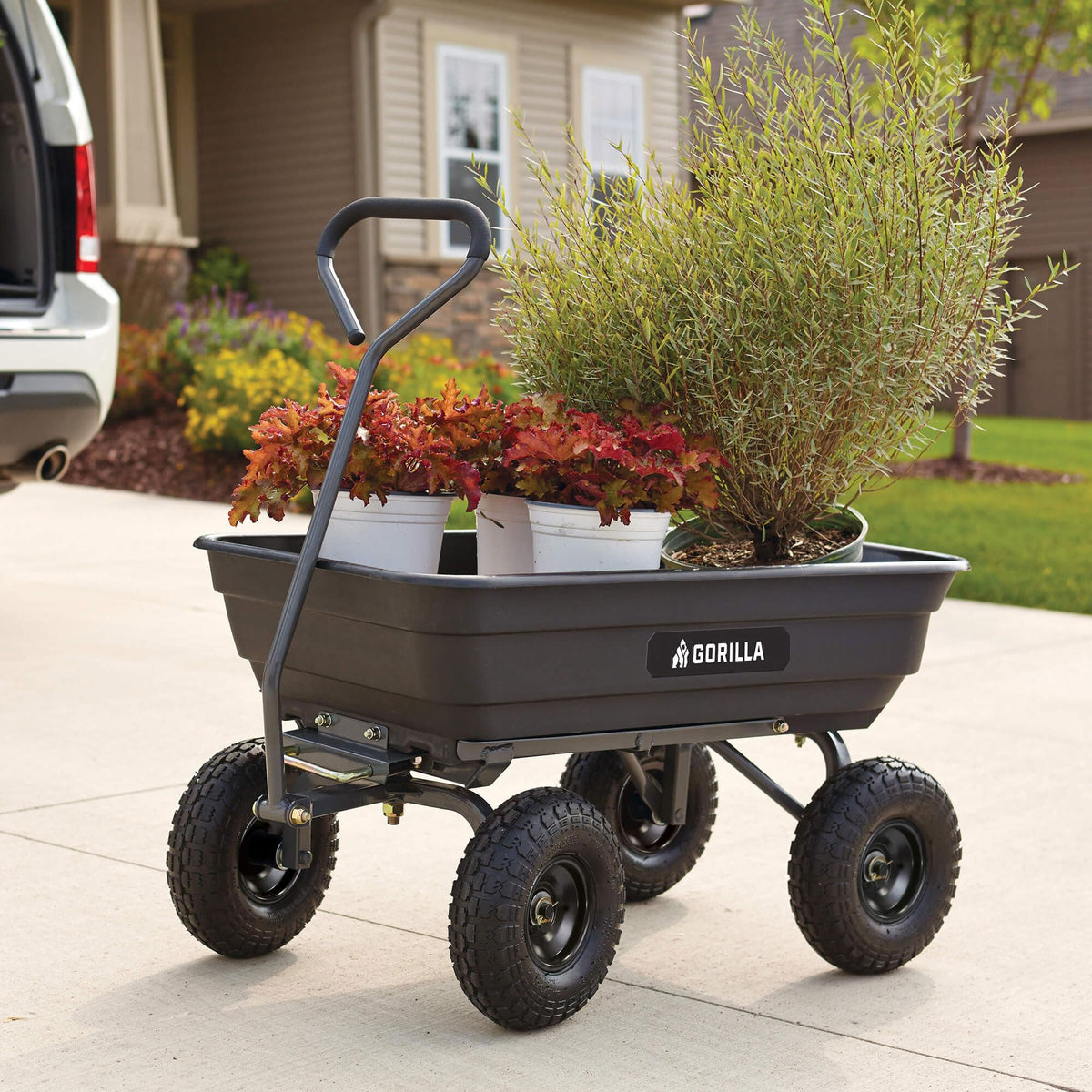 Gorilla Carts Poly Garden Dump Cart, 4 Cu Ft Tub, 600 lb Haul Capacity, Black – Heavy-Duty Utility Wagon with Quick-Release Dumping & Pneumatic Tires for Yard, Landscaping and Gardening